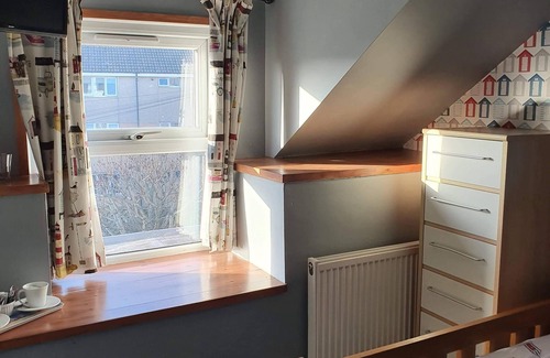 Holyhead House | The Hut Sea Front Inn
