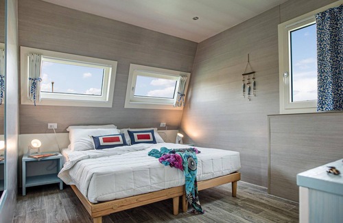 Lignano Sabbiadoro Boat Rental | The ideal place to unwind ? comfortable and modern houseboat on the river Tagliamento.