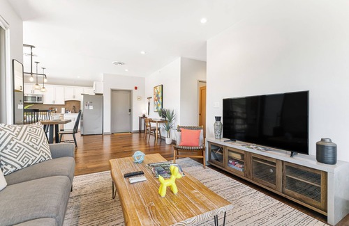 Historic Montford Condo | The Kingfisher - Fantastic 2-bedroom condo with mural, elevator, and WFH setup