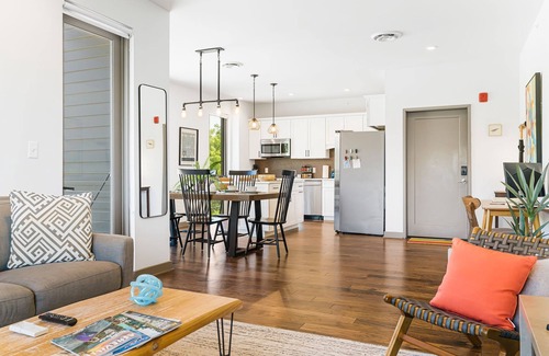 Historic Montford Condo | The Kingfisher - Fantastic 2-bedroom condo with mural, elevator, and WFH setup