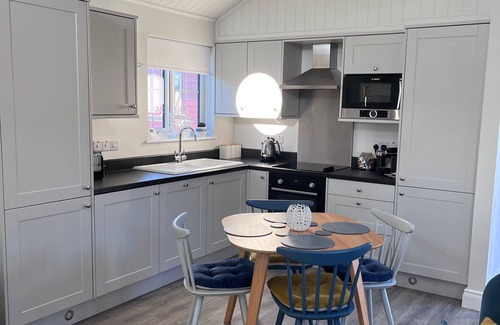 Filey Ski Chalet | The Lake House - a meadow lodge that sleeps 4 guests in 2 bedrooms