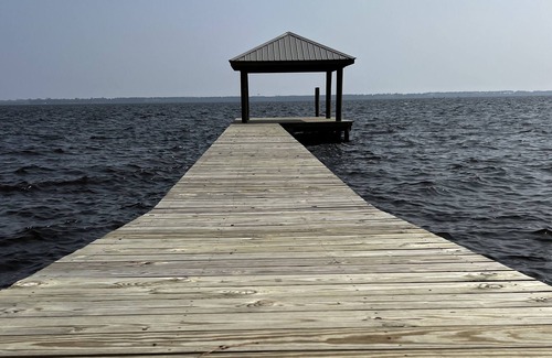 Belhaven House | The Light House -Waterfront Belhaven Home with dock, privacy & incredible views!