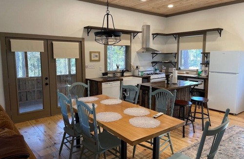 Tallahassee Cabin | The Longleaf Cabin is our largest cabin ideal for 2 families and kids
