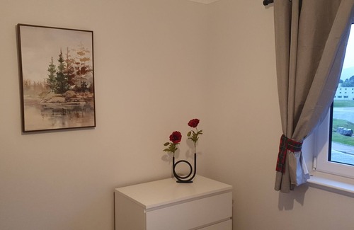 Aviemore Apartment | The MacGregor is a stylish pet friendly two bedroom apartment located in the center of Aviemore