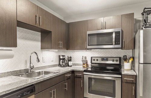 Tuscaloosa Condo | The Melanie 1st Floor Riverfront Condo with Pool & Gym Access