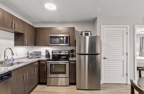 Tuscaloosa Condo | The Nelson 1st Floor Riverfront Condo with Pool & Gym Access