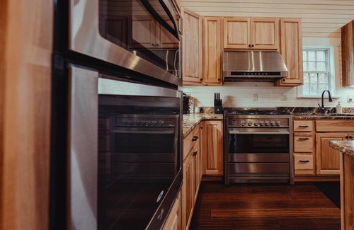 South Bloomingville Cabin | The Nest - The Nest at Pine Creek CabinsCamping Resort in Hocking Hills, just minutes from Hocking Hills State Park! A charming, cozy, pet-friendly cabin. A great gathering space also offering plenty of privacy. Book your nest among the trees!