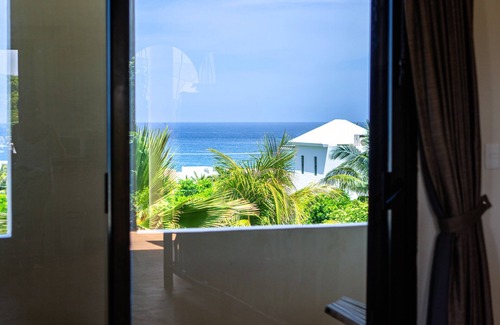 Isla Mujeres Apartment | The Norte Suite at Boutique Hotel Bed and Breakfast with views of Caribbean Sea