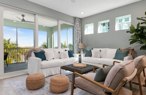 Whitney Beach House | The Oasis at One Particular Harbor! Modern tropical condo in Margaritaville!
