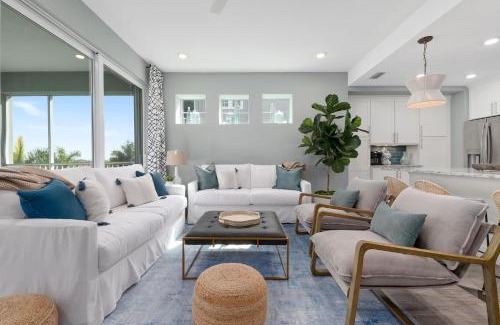 Whitney Beach House | The Oasis at One Particular Harbor! Modern tropical condo in Margaritaville!