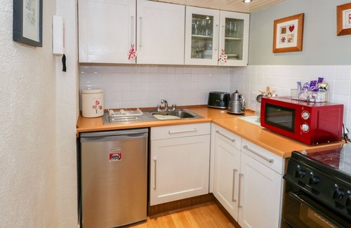 Lindale Cottage | THE OLD APPLE BARN, pet friendly, with a garden in Lindale