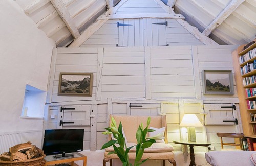 Tal-y-Cafn Cottage | The Old Barn - dog friendly, sleeps 6 guests in 3 bedrooms