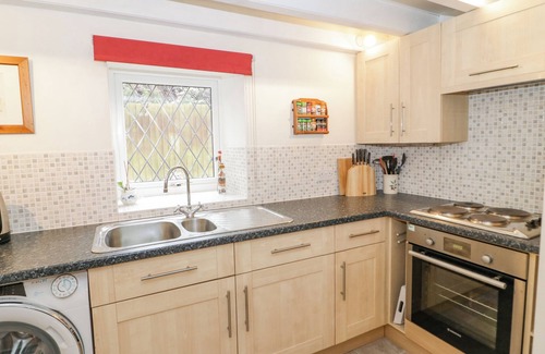 Llanferres Cottage | THE OLD BARN, pet friendly, with a garden in Ruthin