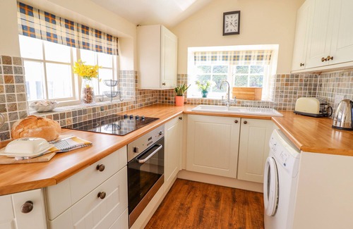 Colwyn Bay Cottage | THE OLD POST OFFICE, pet friendly, with open fire in Old Colwyn