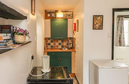 Knowstone Cottage | THE OLD WORKSHOP, pet friendly, with a garden in Knowstone