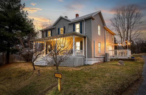 Luray House | The Orchard, a family friendly home- hot tub, fire pit, yard games
