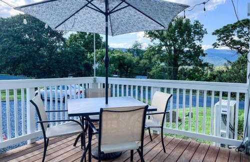 Luray House | The Orchard, a family friendly home- hot tub, fire pit, yard games