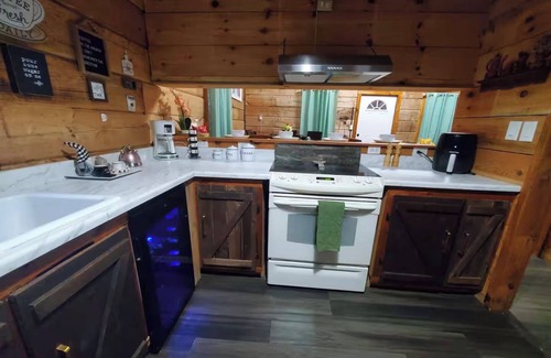 Kodak Cabin | The Outdoor Oasis –You Get $1089 Attraction Tickets per paid day, Dollywood Inc