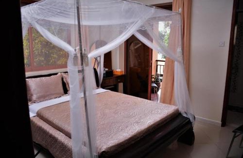 Entebbe House | The Palms Beach Hotel and Restaurant Limited