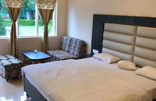 Mayapur Hotel | THE PALMS RESORT