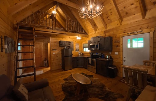 South Bloomingville Cabin | The Peak - The Peak Cabin in Hocking Hills, OH offers a cozy, pet-friendly getaway with a hot tub, fire pit, and scenic views. Ideal for couples and families, it’s just minutes from top attractions and hiking trails. Book your stay today!