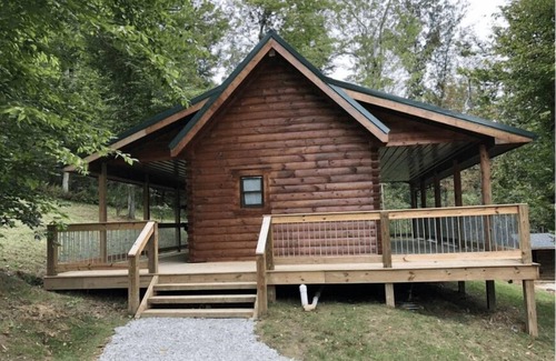 South Bloomingville Cabin | The Peak - The Peak Cabin in Hocking Hills, OH offers a cozy, pet-friendly getaway with a hot tub, fire pit, and scenic views. Ideal for couples and families, it’s just minutes from top attractions and hiking trails. Book your stay today!