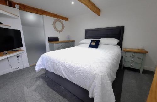Camborne Apartment | The Penthouse, top floor of a Grade II Listed Mill