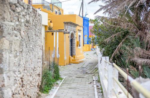Kallithea House | The red door in Koskinou