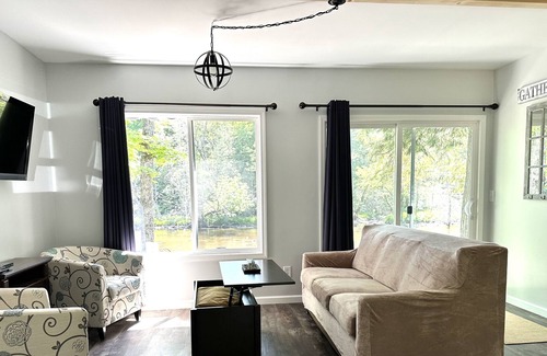 Suring Cottage | The Rivers Edge Cottage! ATV-UTV-Snowmobiling right out your front door!