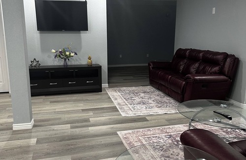 Aurora House | The room has bathroom and king size bed and a shared living room. Super cozy!