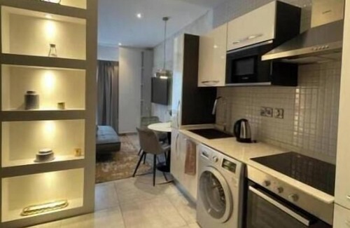 East Legon Apartment | The Signature Hotel queen studio with balcony #7