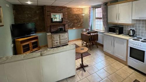 Tyrone Apartment | The Slates Apartments - Fuchsia & Orchard Apartments