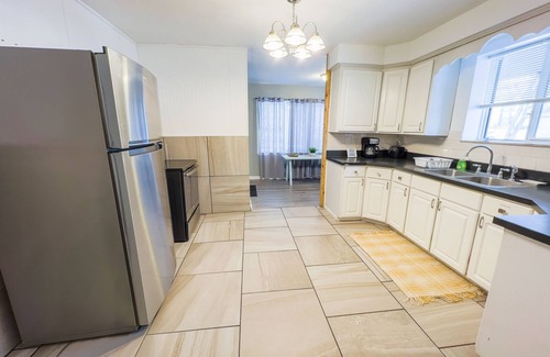 Niagara Falls Apartment | The Stone Castle - With Private Yard & Parking, Near Falls & Casino by Niagara Hospitality