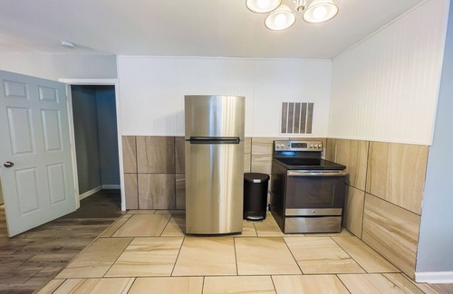 Niagara Falls Apartment | The Stone Castle - With Private Yard & Parking, Near Falls & Casino by Niagara Hospitality