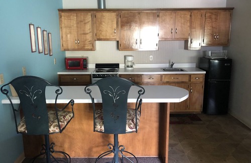 Tompkinsville Hotel | The Tompkinsville Inn