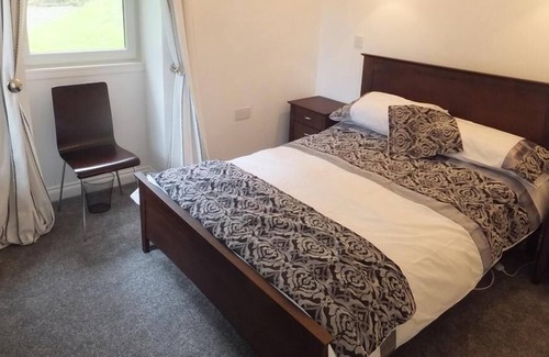 Lochgilphead Cottage | The Turbine House - a cottage that sleeps 2 guests in 1 bedroom