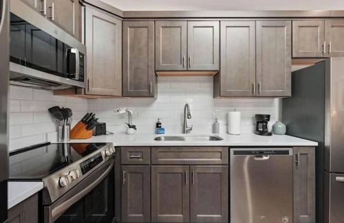 South Salt Lake Apartment | The Ultimate SLC Studio - Fireplace - Hot Tub - Firepits-Shared Backyard+Parking