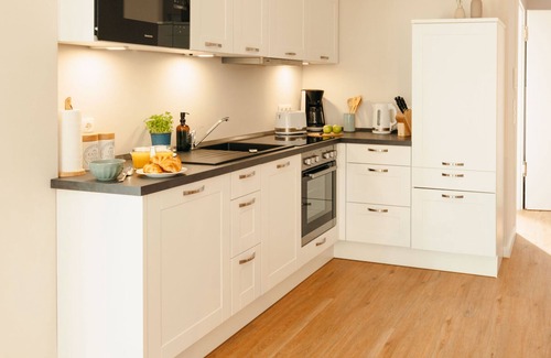 Ratzeburg Apartment | The vacation apartment with large roof terrace is located in the forest on Ratzeburger Küchensee