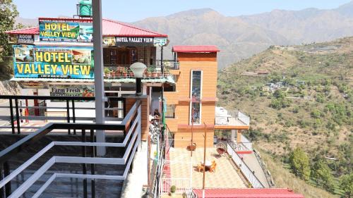 Mussoorie Hotel | The Valley View -"in the lap of valley"- Mountain view ! Personal Balcony ! Open Terrace ! Rooftop Cafe ! Large Parking ! free WiFi