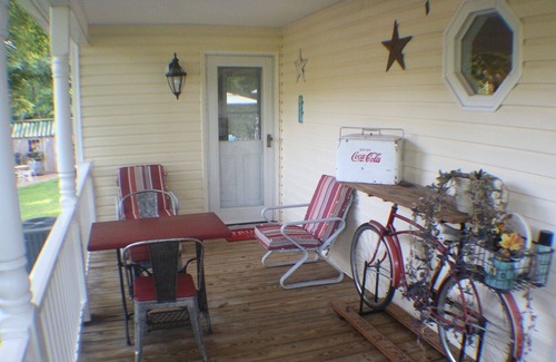 Randolph County Bed & Breakfast | The vanilla house has a large deck with fountain and very nice porch.