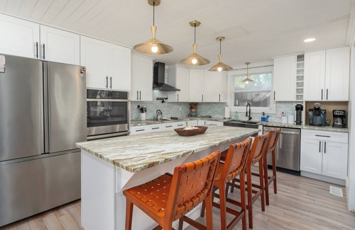 Blue Heron Lake House | The Webber · Boho Beach House w Private Patio and Golf Cart