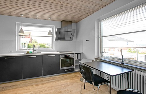Tejn House | The well-appointed cottage has two floors and offers sea views from the house and the property.