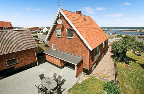 Tejn House | The well-appointed cottage has two floors and offers sea views from the house and the property.