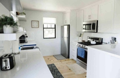 Julian House | The White Barn