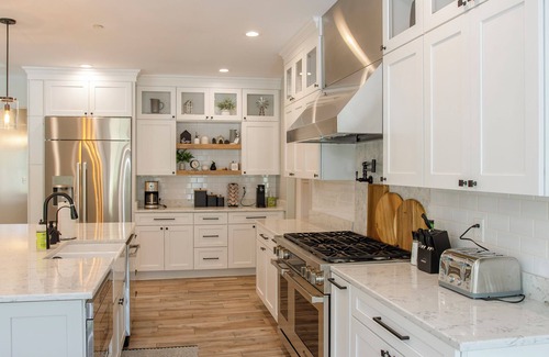 Denton House | The Wilder Way with a beautiful pool, hot tub, and a pickleball court!