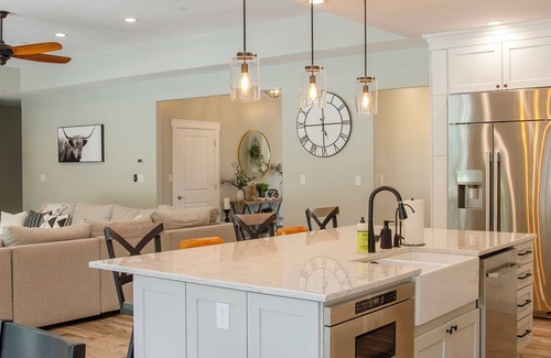 Denton House | The Wilder Way with a beautiful pool, hot tub, and a pickleball court!
