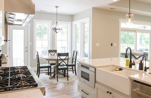 Denton House | The Wilder Way with a beautiful pool, hot tub, and a pickleball court!
