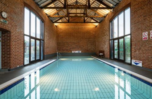 Sculthorpe House | The Woodpecker Cottage