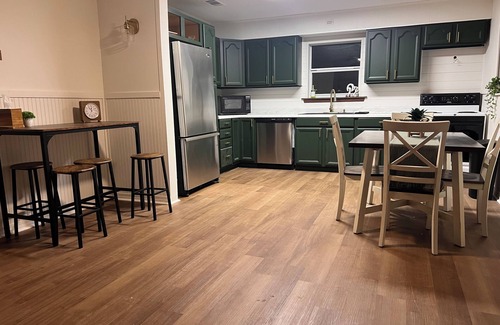 Fluker House | The Woods Camp w/fire pit, propane grill, and waterfront view on the River