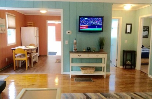 Michigan City Cottage | The Yellow House Near the ShorenWalking distance to Sheridan Beach,